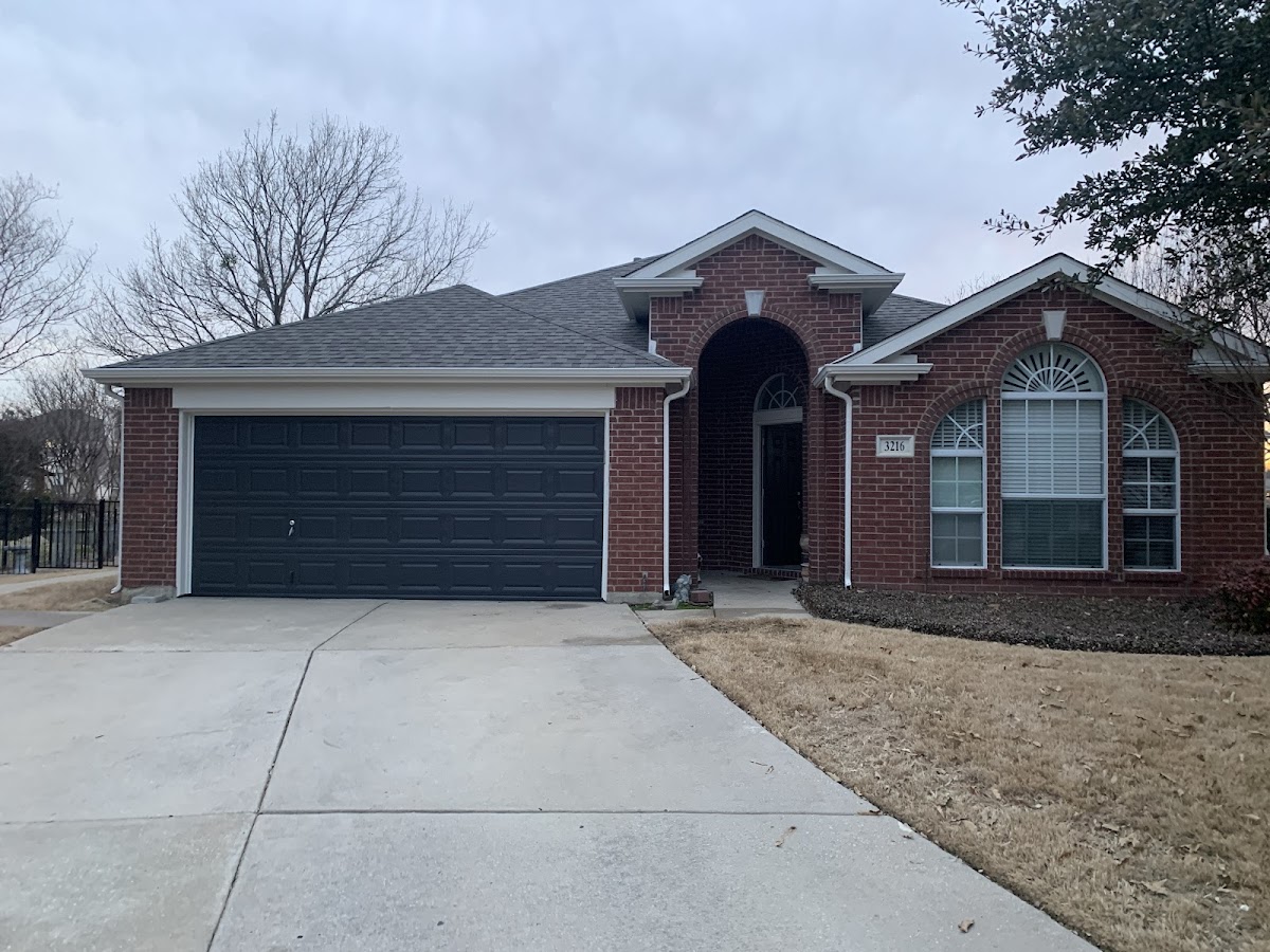 Freshly painted brick home exterior by K&A Painting Co. in Krum, Texas