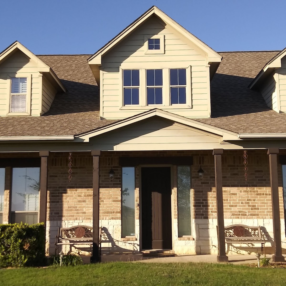 Home exterior with freshly painted siding and trim